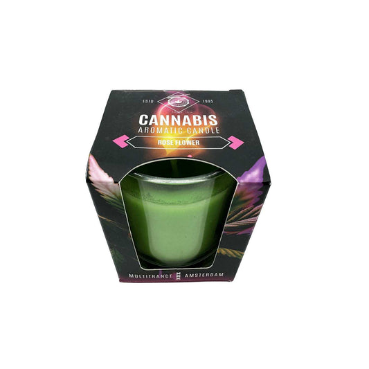 Bougie parfumée en pot en verre vert visible à travers l’étui noir