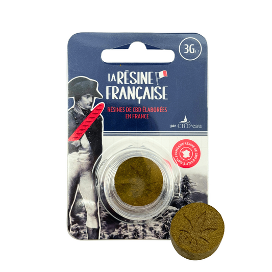 Résine CBD pollen jaune, 3 g, avec morceau de résine à côté