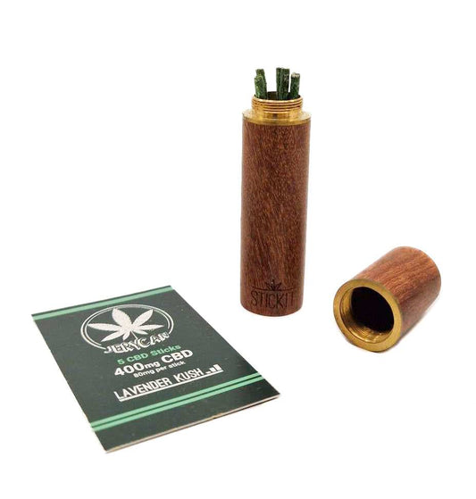 Tube CBD cylindrique marron JERYCAN STICKIT avec embout vert et carte produit