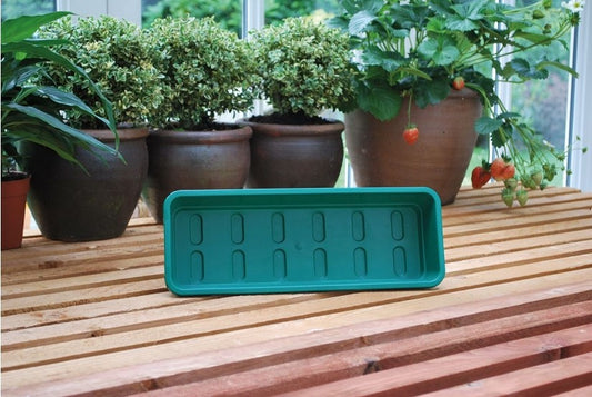 Bac de jardin allongé vert, côtés hauts, rainures et poignées moulées, sans trous visibles