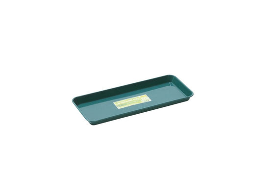 Petit plateau rectangulaire vert à rebord, surface intérieure lisse