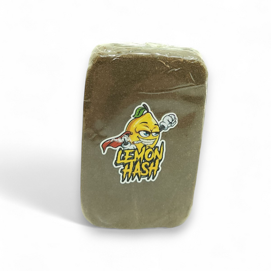 Bloc de résine brun foncé emballé sous film plastique, logo Lemon Hash