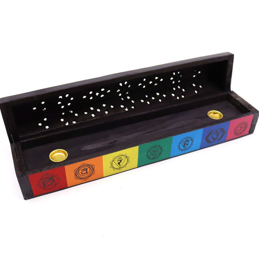 Porte-encens en bois noir, couvercle ouvert, trous de diffusion et frise 7 chakras.