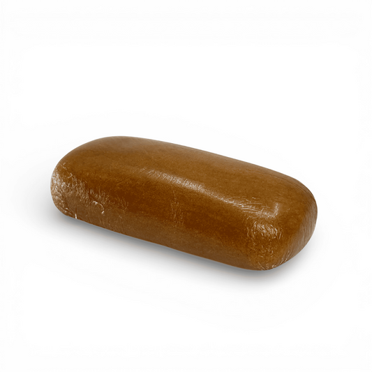 Résine solide ambrée, barre cylindrique brun clair, aspect lisse et compact