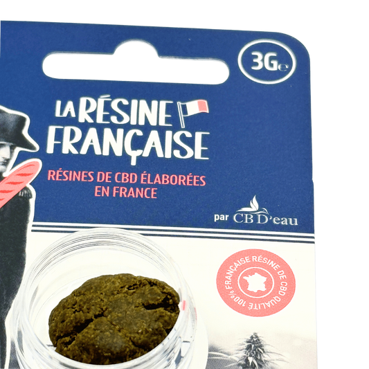 Boîte La Résine Française : pot de résine CBD sombre, emballage bleu et blanc.