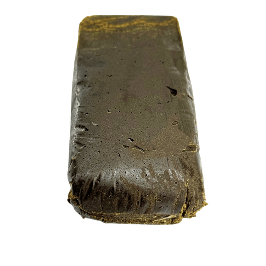 Bloc de résine Black Butter CBDX noir/gris, surface granuleuse, base rectangulaire.