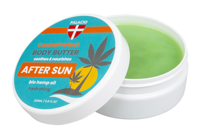 Pot de beurre corporel après-soleil au chanvre ouvert, crème verte visible dans le pot blanc