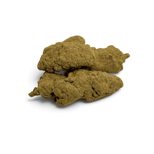 Fleurs de CBD 72% : tas de plusieurs morceaux brun-vert à texture friable.