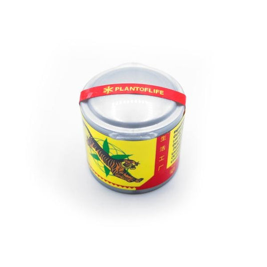 Baume CBD 3% CANNATIGER en pot, couvercle fermé, étiquette jaune et verte.