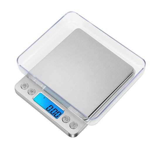 Balance de cuisine numérique avec plateau transparent et écran bleu